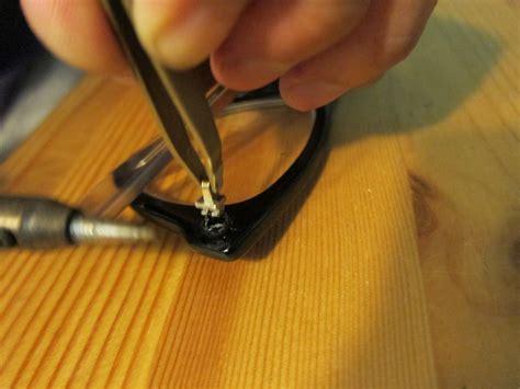 repair broken glasses hinge.